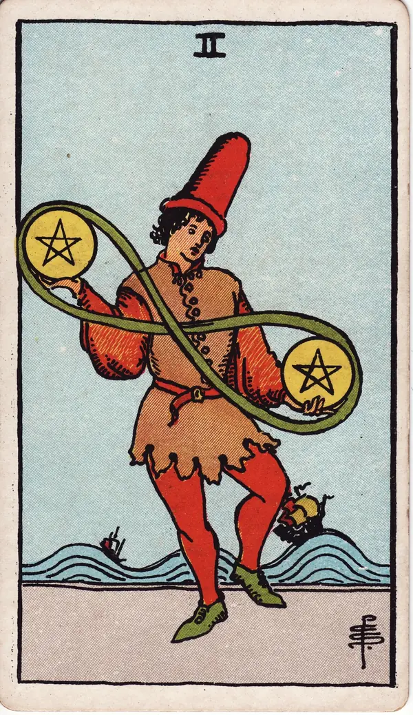 Two of Pentacles tarot card (1909 public-domain deck)